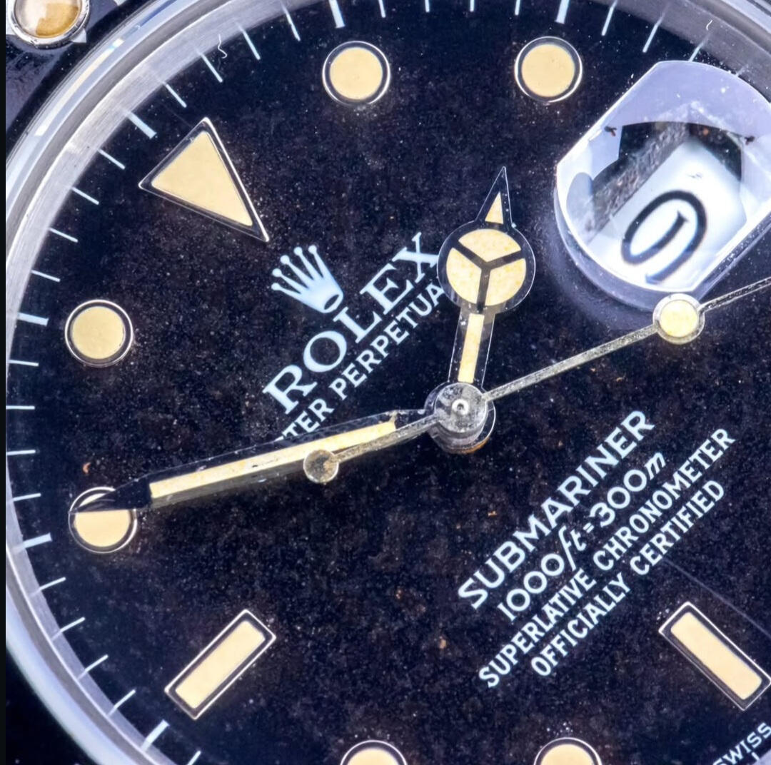 Water-damaged Rolex Submariner dial with naturally aged patina